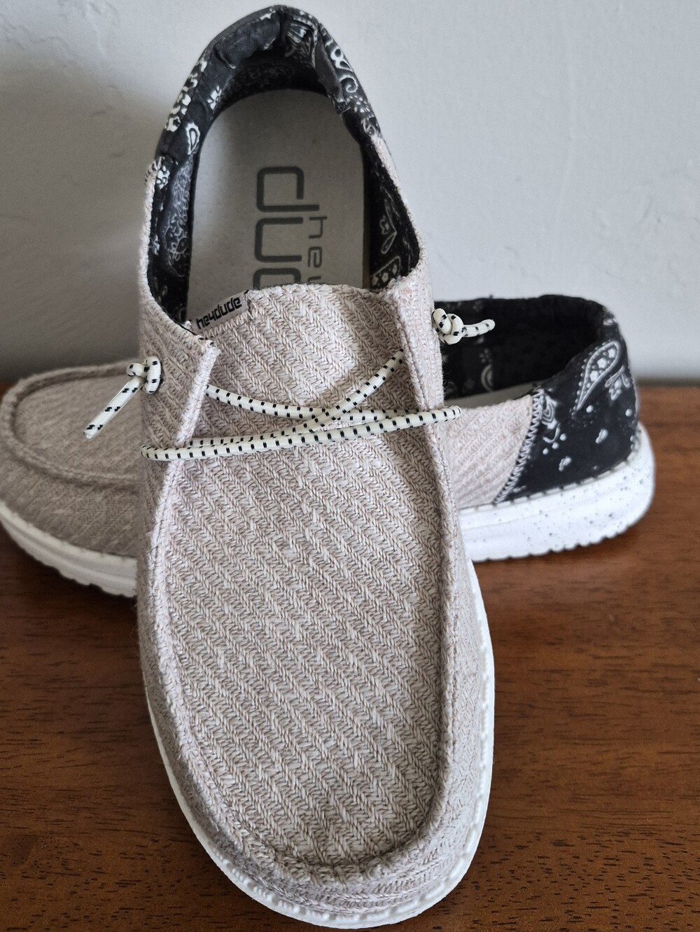 Hey Dude Slip-On Shoes in Light Beige with Black Paisley Heel